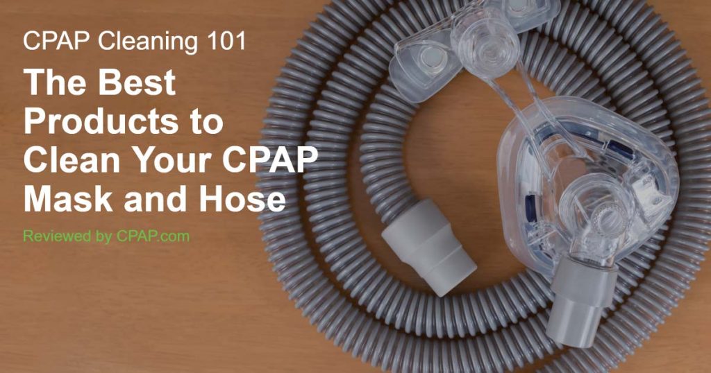 CPAP mask resting on coiled CPAP hose