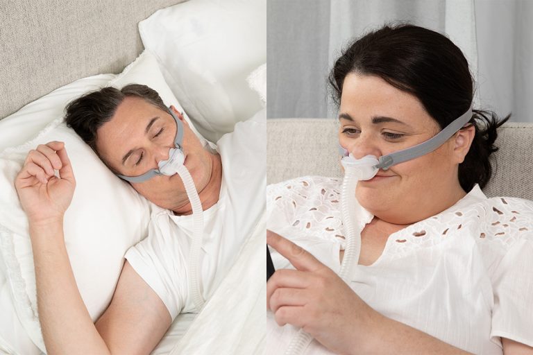 Man sleeps soundly wearing airfit p10 juxtaposed against woman awake and reading in bed wearing airfit p10 for her