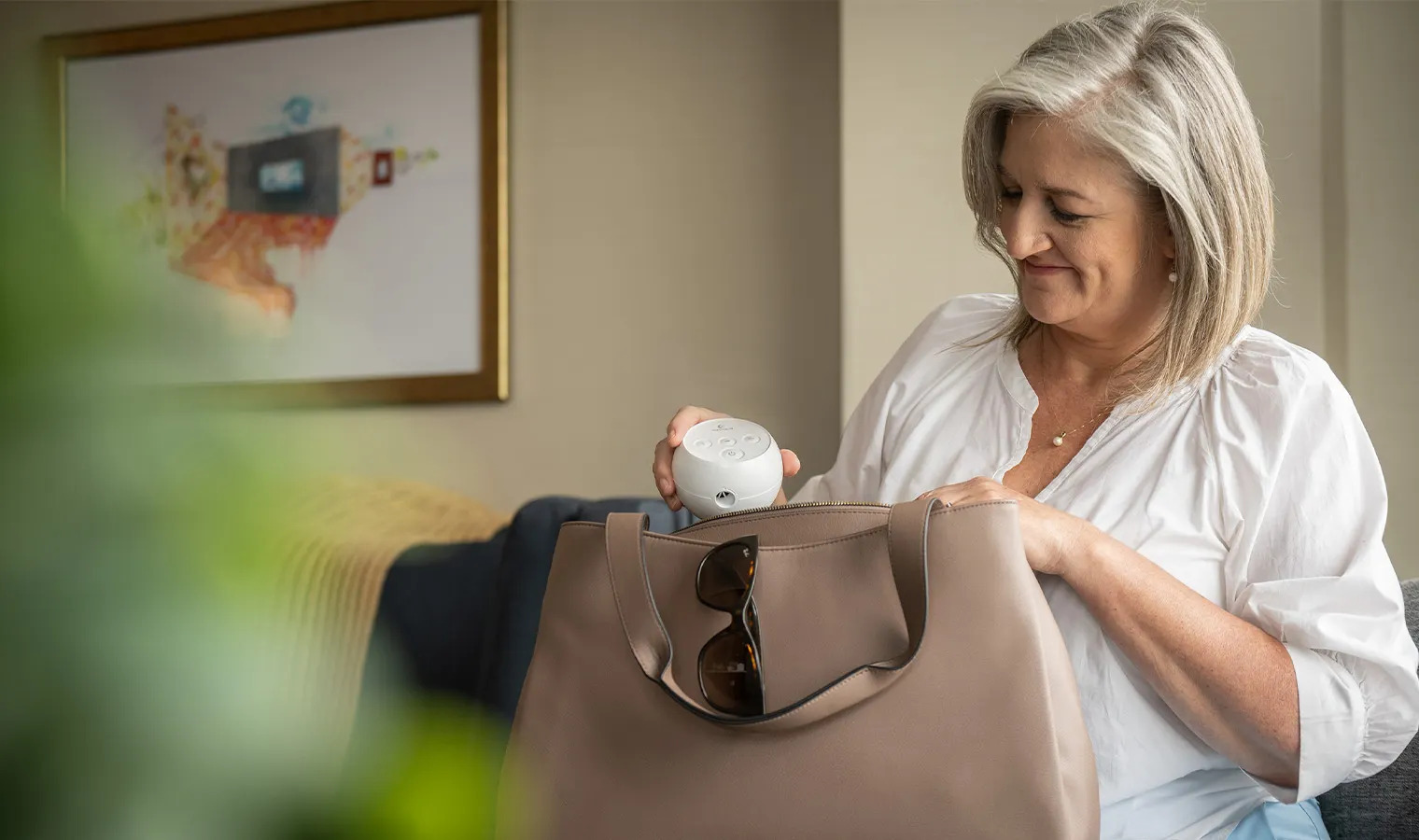 Photo of woman packing the Transcend Micro Travel CPAP into her bag