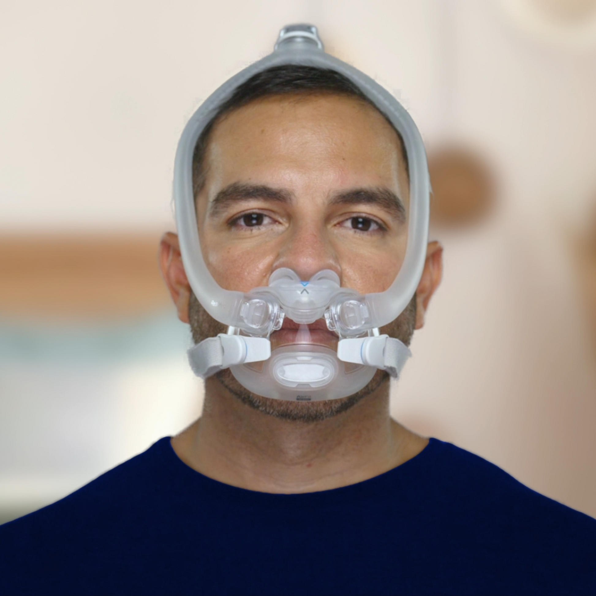 Man wears AirFit X30i staring directly at camera.