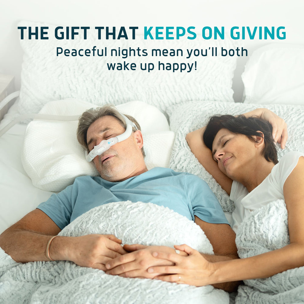 A man wearing a CPAP mask and a woman sleeping peacefully on white Lunderg memory foam pillows.
