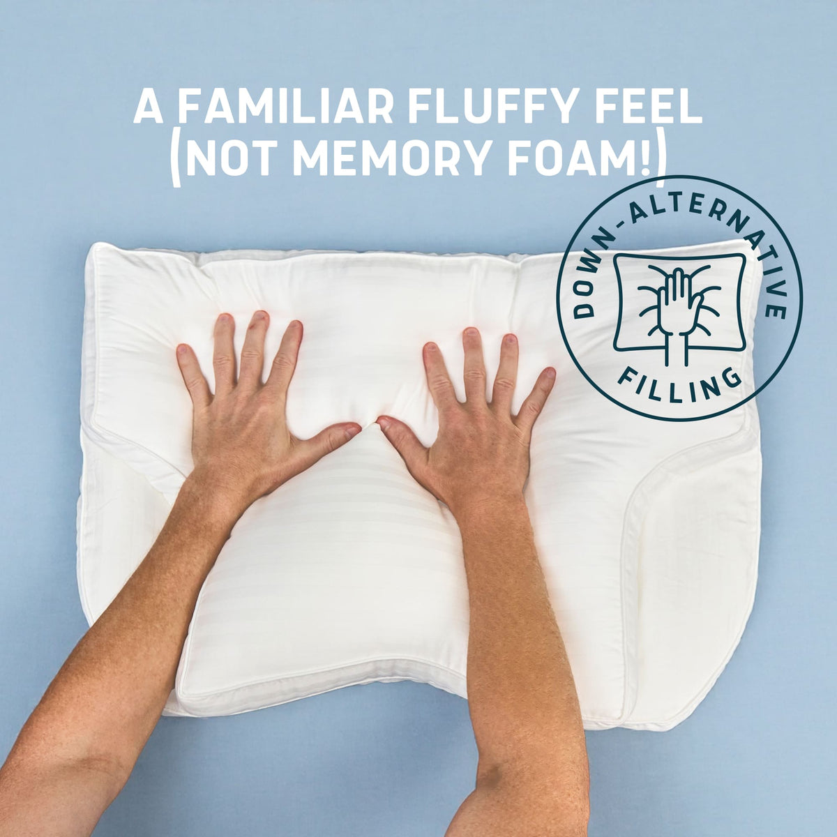 Lunderg down alternative CPAP pillow being pressed by two hands to show fluffy texture.