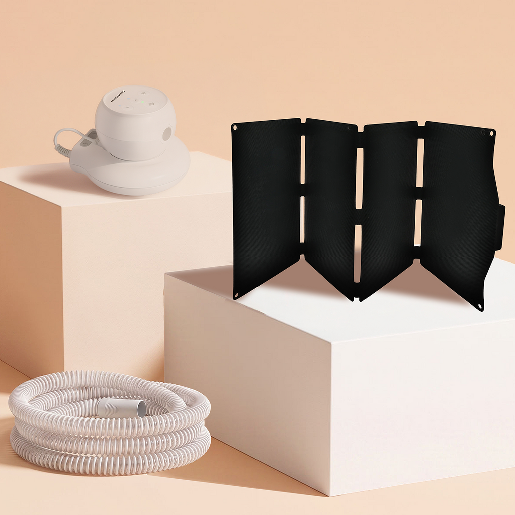 CPAP humidifier accessory kit with white humidifier unit, black water tank baffle, and white hose.