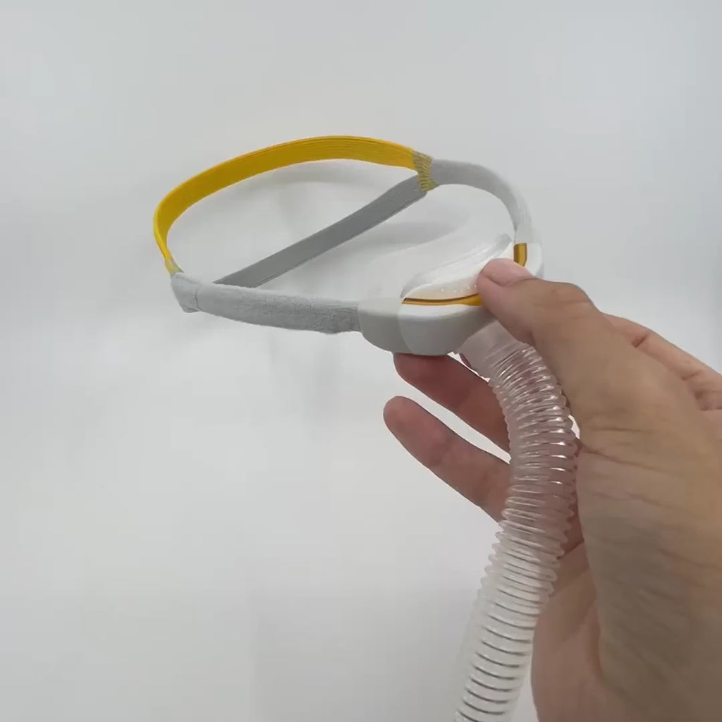 Short video showing F&P solo nasal pillow mask's autofit headgear, swivel hose connection, simply disassembly/reassembly, and nasal pillow cushion swappable with solo nasal cradle cushion.