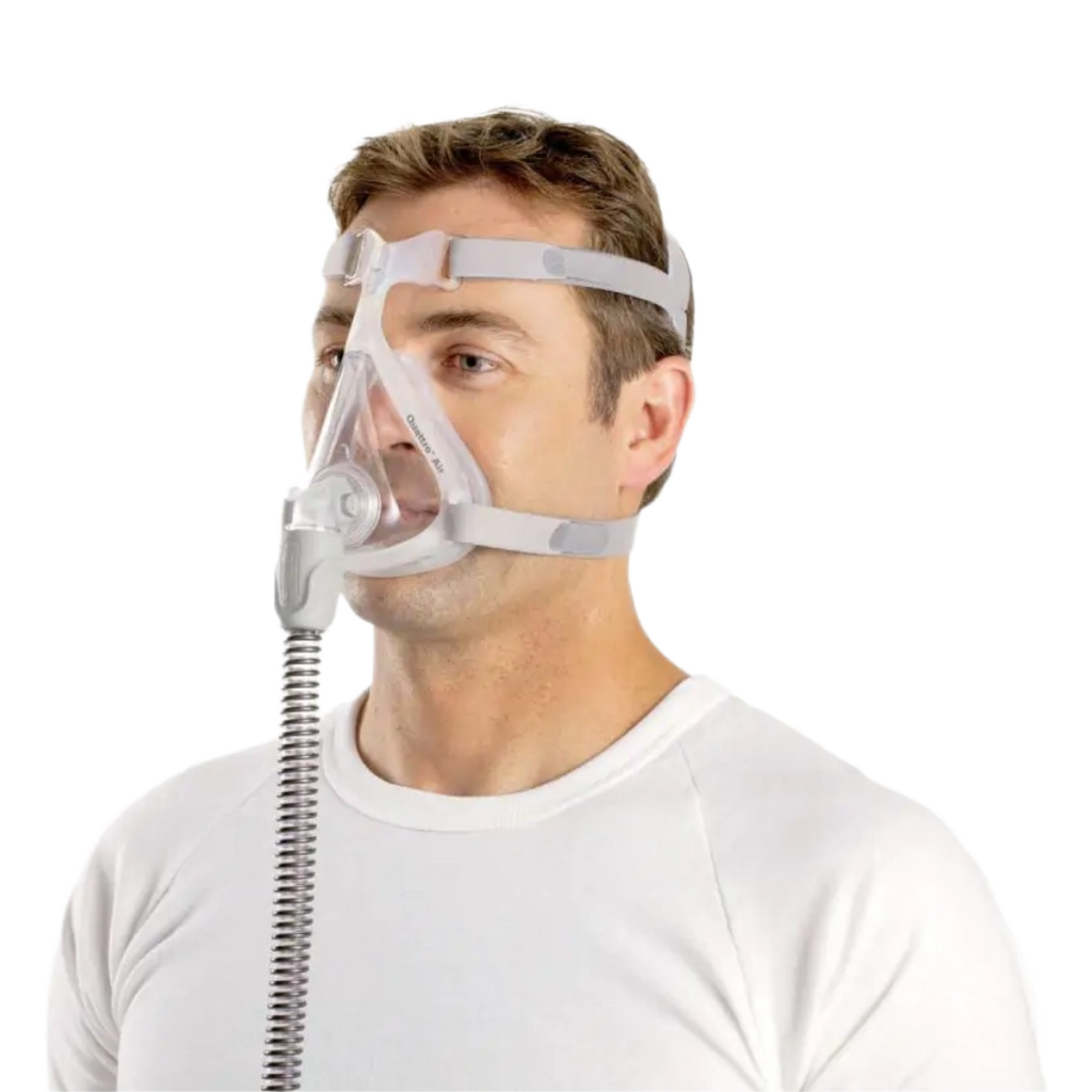 Image of a man using a Quattro™ Air Full Face Mask with Headgear from a quarter angle